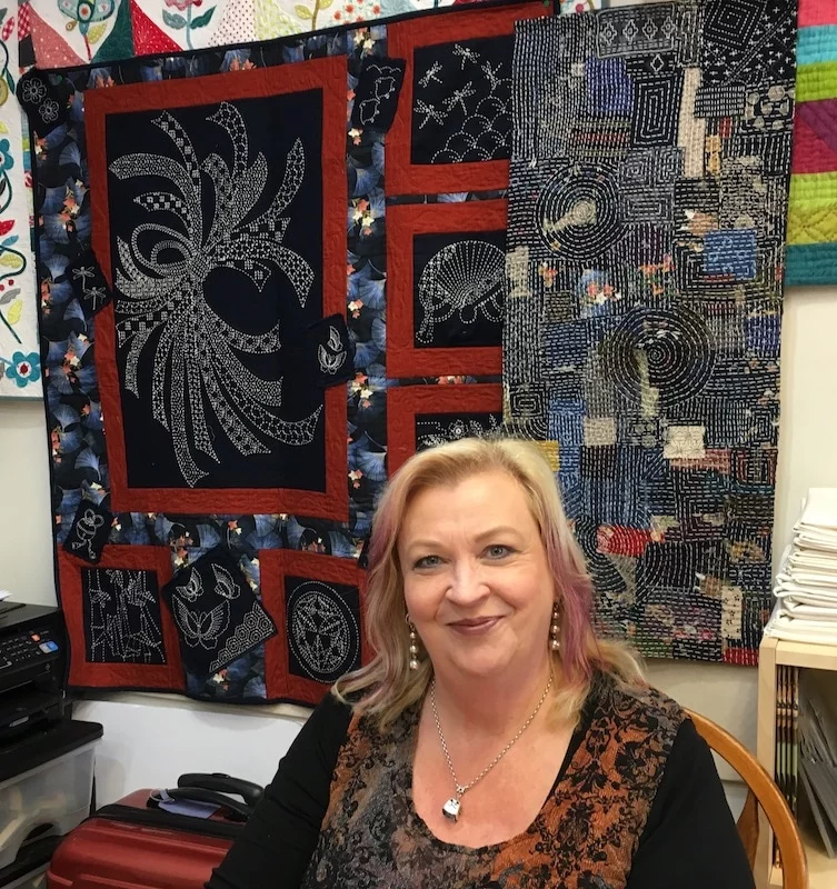 Teacher Jennifer Corkish with some of her wonderful Japanese inspired work begins her.
