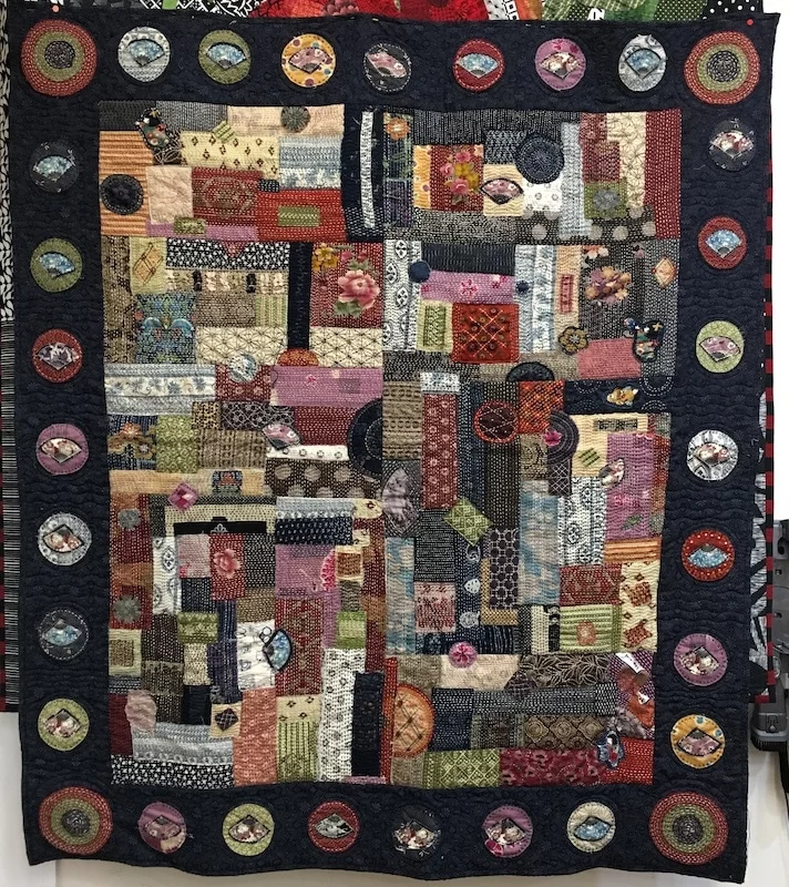 A quilt by Faye Ison made with Jennifer featuring Boro Stitching 'blocks'